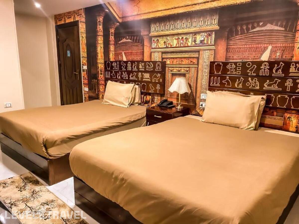 фотографии номера Делюкс (две односпальные кровати) отеля Giza Pyramids Inn в Египет(Гиза) - фото №1