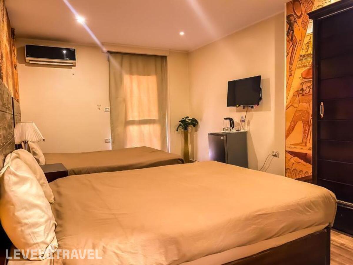 фотографии номера Делюкс (две односпальные кровати) отеля Giza Pyramids Inn в Египет(Гиза) - фото №6
