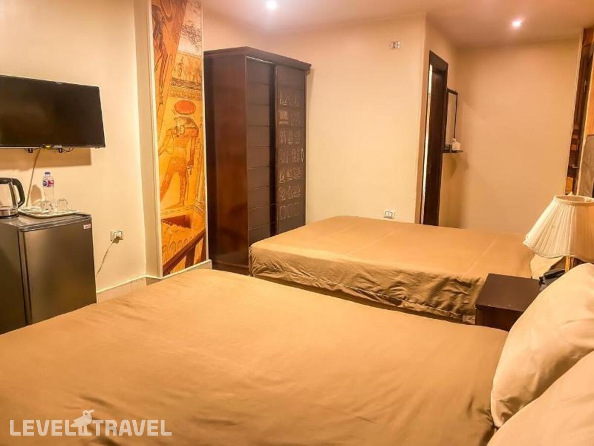 фотографии номера Делюкс (две односпальные кровати) отеля Giza Pyramids Inn в Египет(Гиза) - фото №2