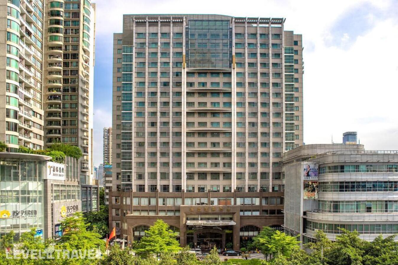 фотографии номера Номер Бизнес отеля Guangzhou Grand International Hotel в Китай(Гуанчжоу) - фото №1