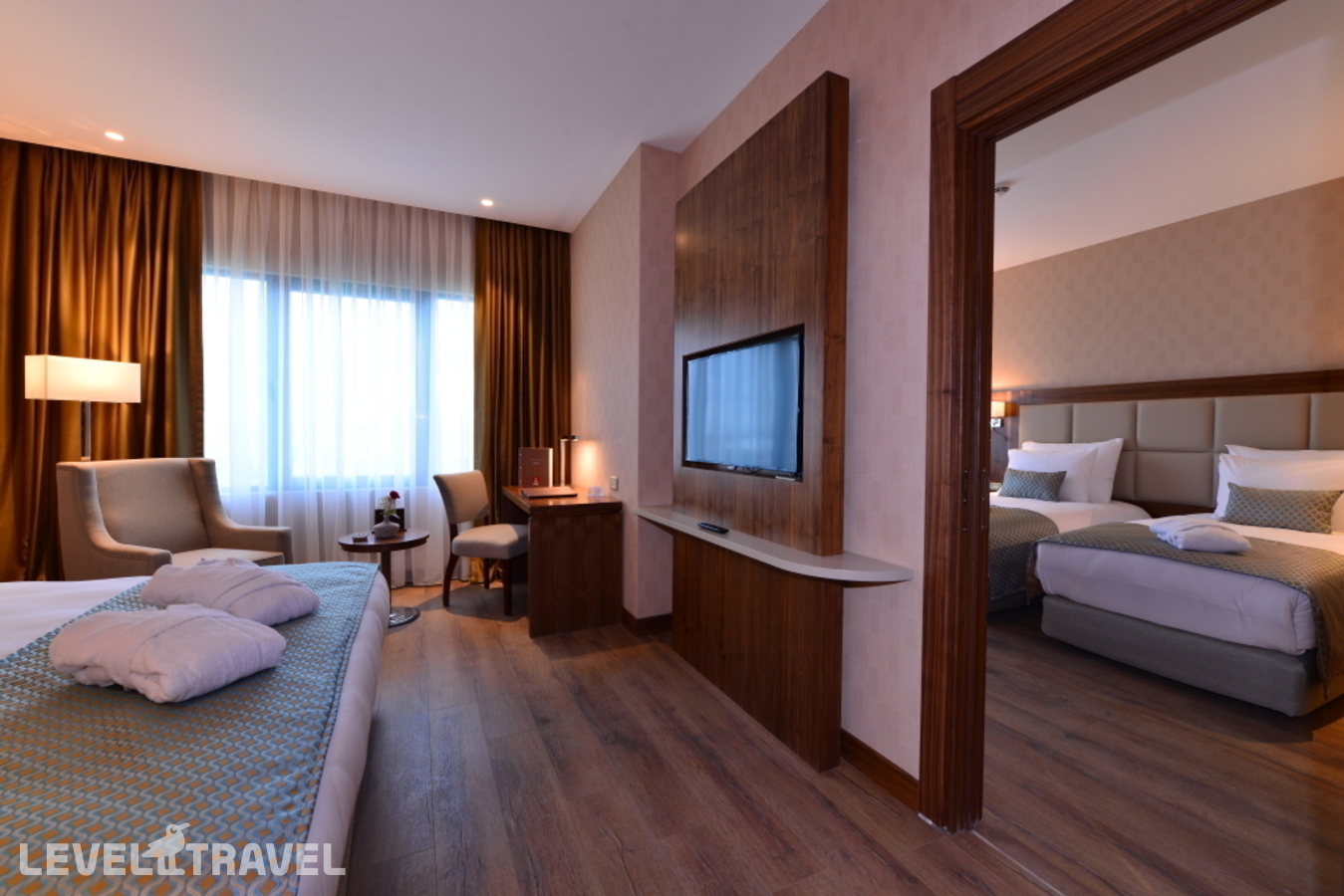 фотографии номера Номер бизнес (две односпальные кровати) отеля Clarion Hotel Istanbul Mahmutbey в Турция(Багджылар) - фото №3