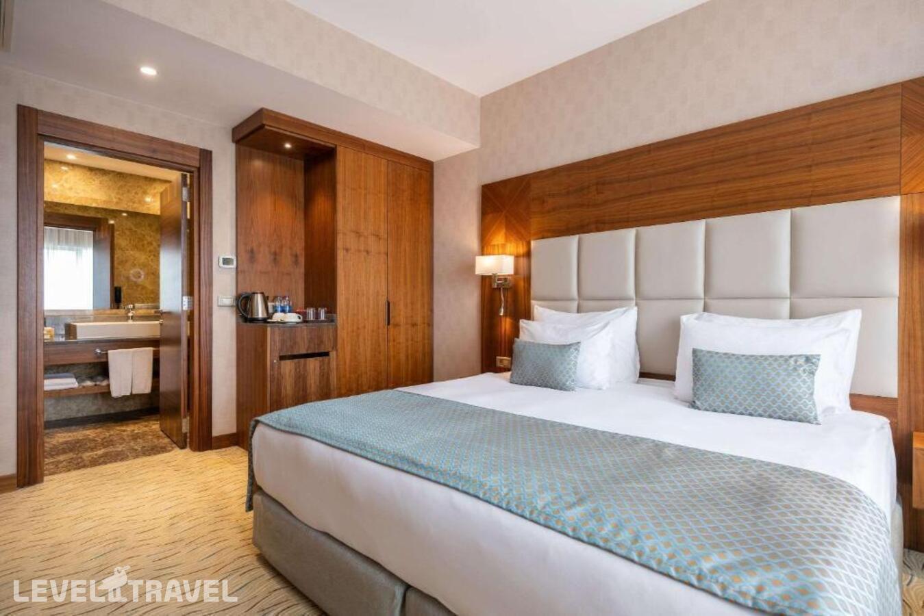 фотографии номера Номер бизнес (две односпальные кровати) отеля Clarion Hotel Istanbul Mahmutbey в Турция(Багджылар) - фото №1