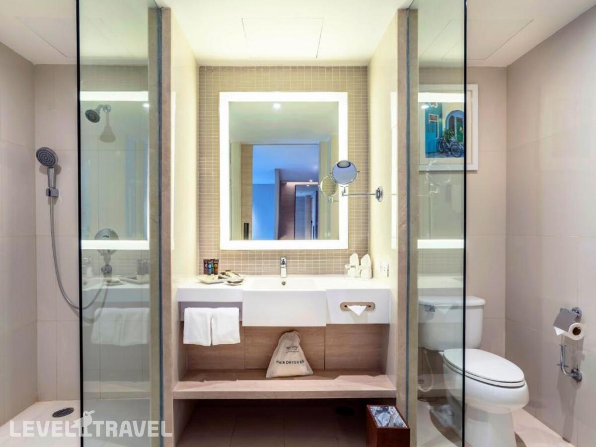 фотографии номера Делюкс с балконом (2 спальни) отеля Novotel Phuket Phokeethra в Таиланд(город Пхукет) - фото №2