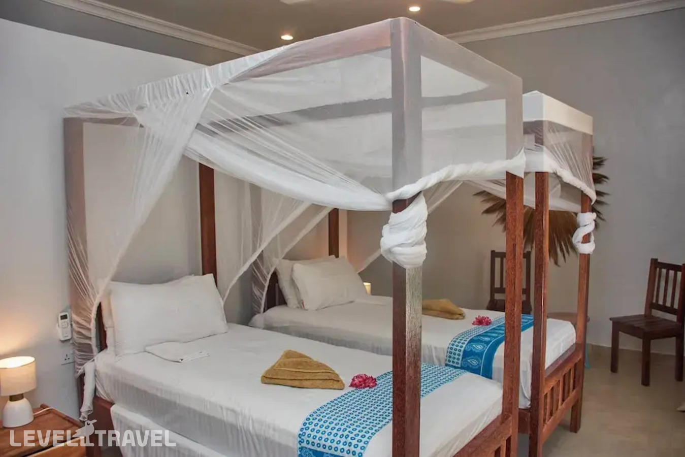 фотографии номера Делюкс (две односпальные кровати) отеля Paje Beach Apartments & Hotel в Танзания(Паже) - фото №1