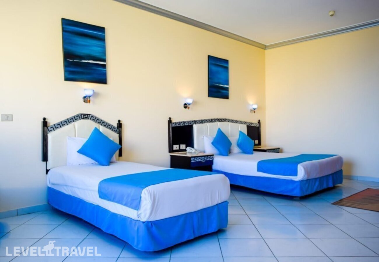 фотографии номера Стандартный с видом на бассейн отеля King Tut Aqua Park Beach Resort в Египет(Хургада (город)) - фото №4