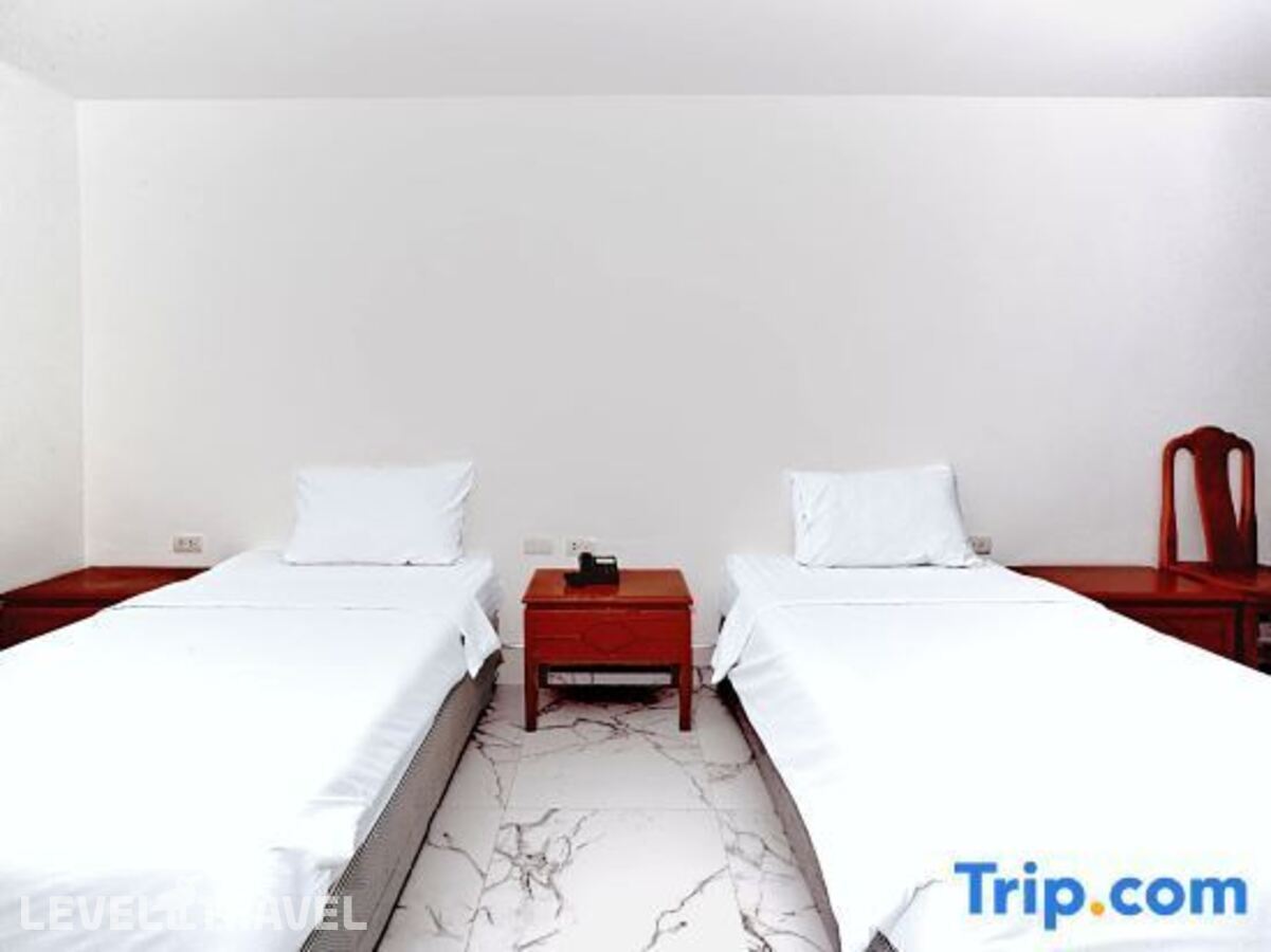 фотографии номера Делюкс (две односпальные кровати) отеля Highfive Guest House в Таиланд(Центральная Паттайя) - фото №3