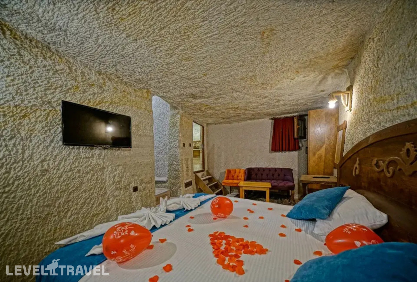 фотографии номера Двухместный номер Cave Jacuzzi двуспальная кровать отеля Cappa Cave Hotel в Турция(Гёреме) - фото №5