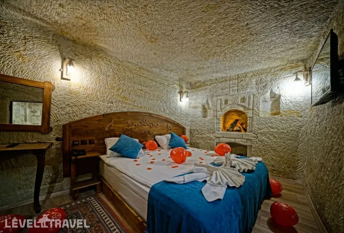 фотографии номера Двухместный номер Cave Jacuzzi двуспальная кровать отеля Cappa Cave Hotel в Турция(Гёреме) - фото №2