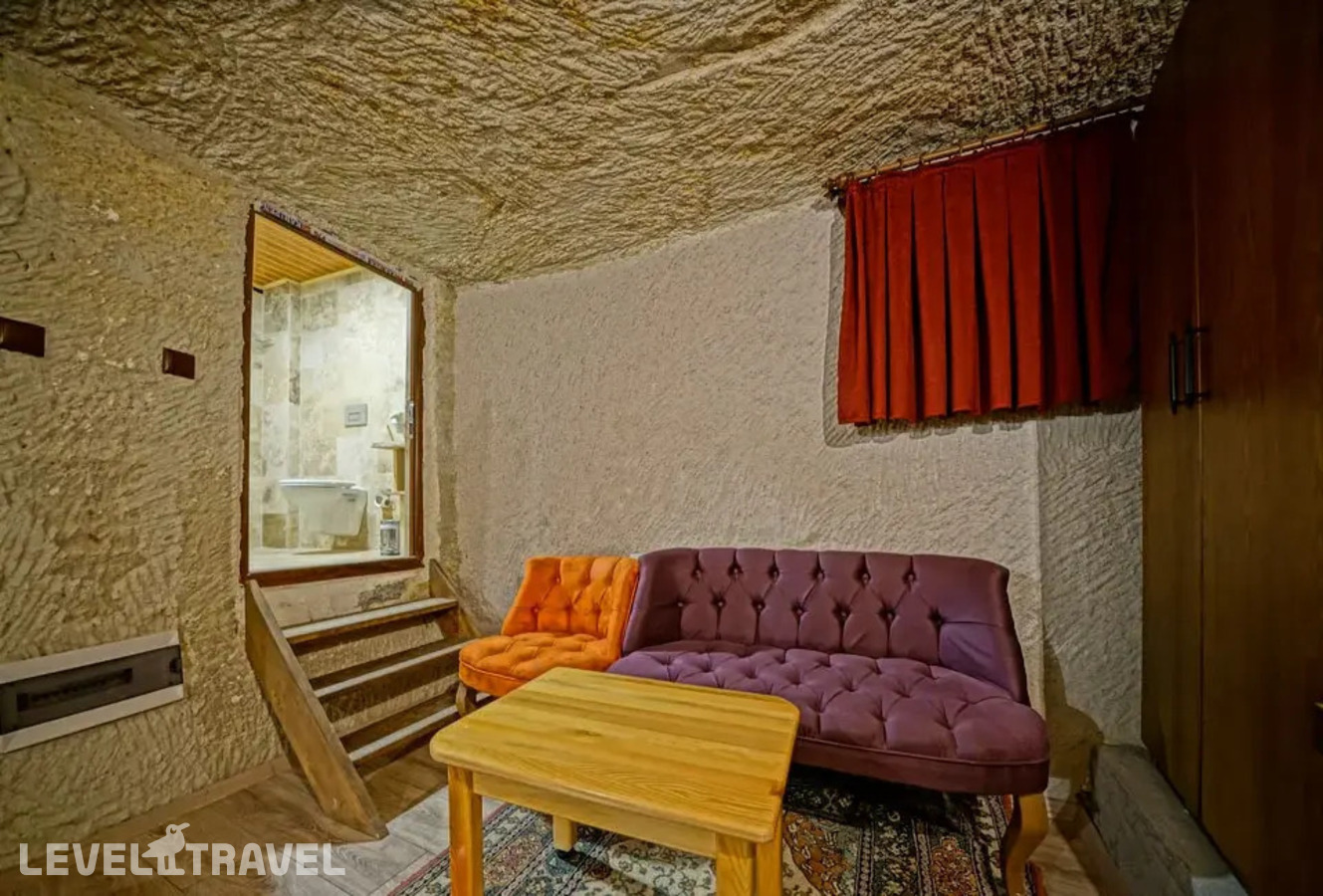 фотографии номера Двухместный номер Cave Jacuzzi двуспальная кровать отеля Cappa Cave Hotel в Турция(Гёреме) - фото №6
