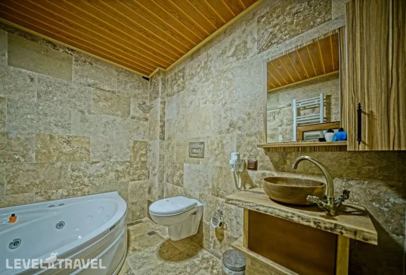 фотографии номера Двухместный номер Cave Jacuzzi двуспальная кровать отеля Cappa Cave Hotel в Турция(Гёреме) - фото №7