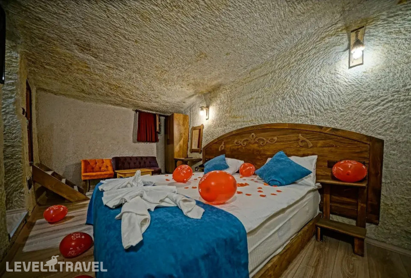 фотографии номера Двухместный номер Cave Jacuzzi двуспальная кровать отеля Cappa Cave Hotel в Турция(Гёреме) - фото №1