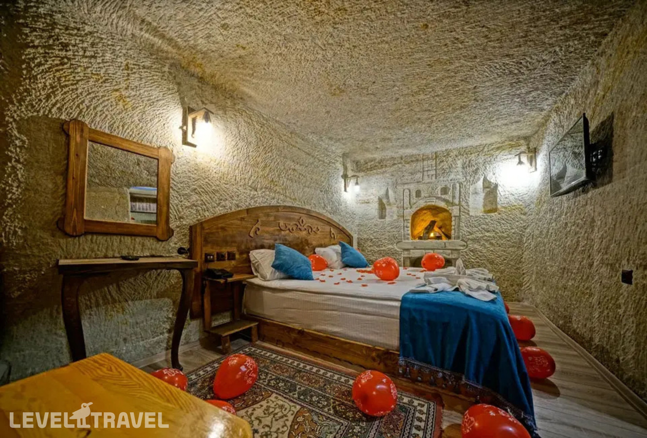 фотографии номера Двухместный номер Cave Jacuzzi двуспальная кровать отеля Cappa Cave Hotel в Турция(Гёреме) - фото №3