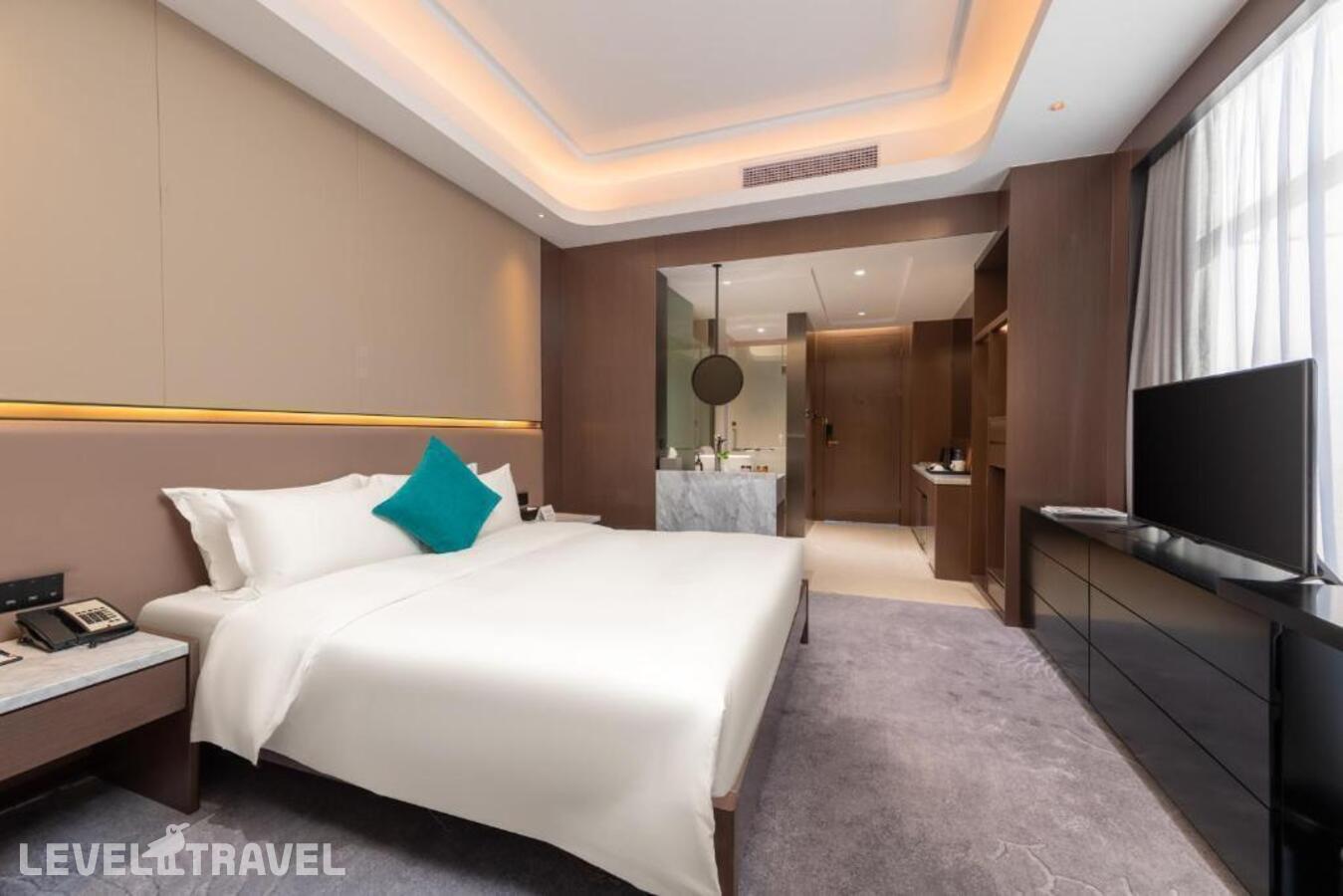 фотографии номера Представительский с видом на город отеля Honder International Hotel в Китай(Гуанчжоу) - фото №4