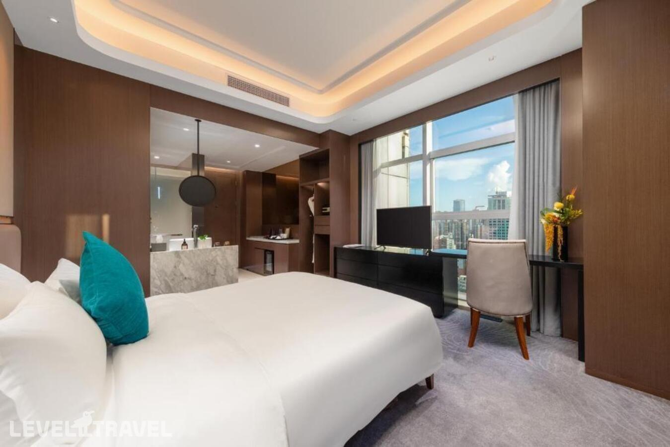 фотографии номера Представительский с видом на город отеля Honder International Hotel в Китай(Гуанчжоу) - фото №2