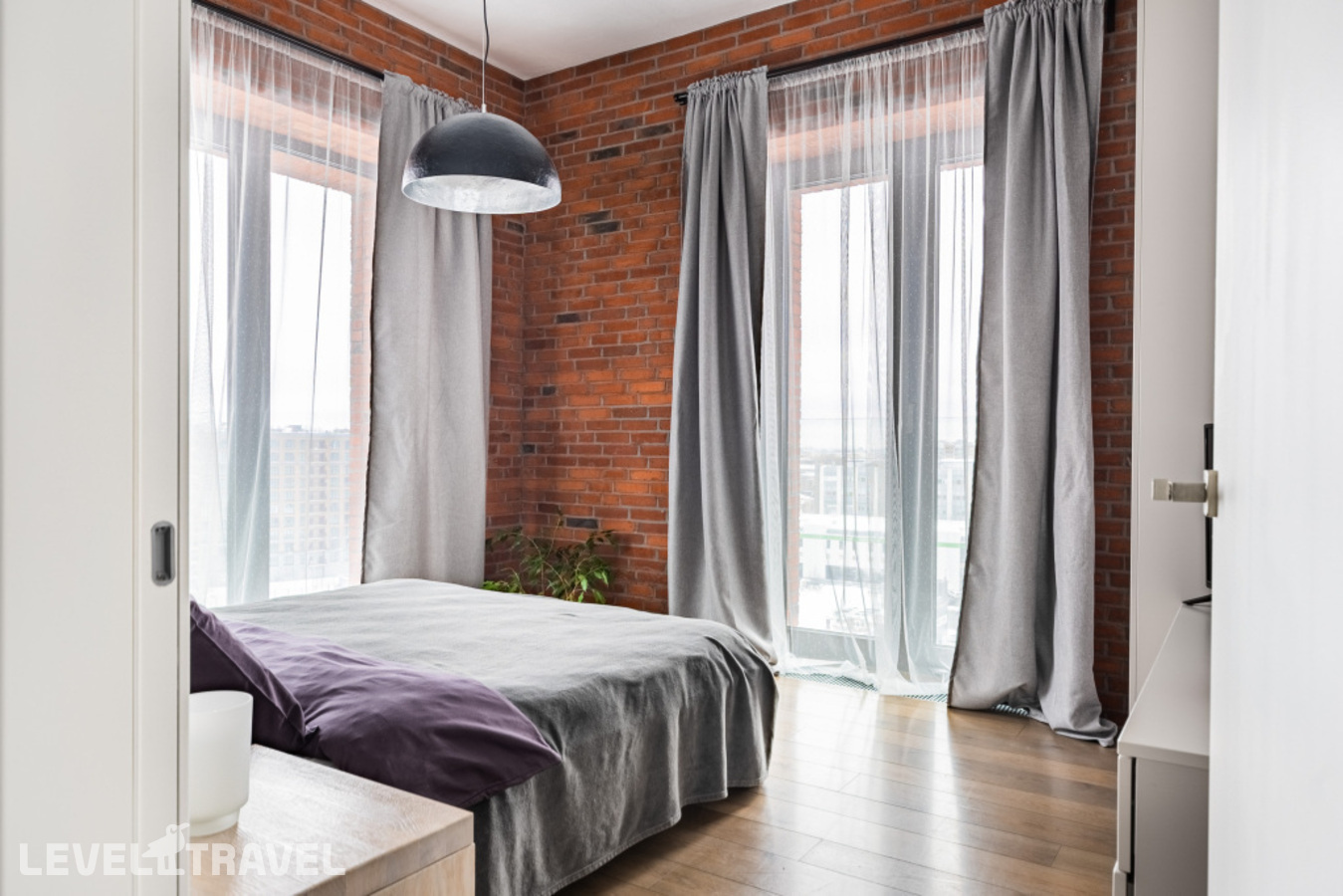 фотографии номера Четырёхместные апартаменты с видом на город отеля SV Loft Apartments (СВ Лофт Апартментс) в Россия(Василеостровский район) - фото №1