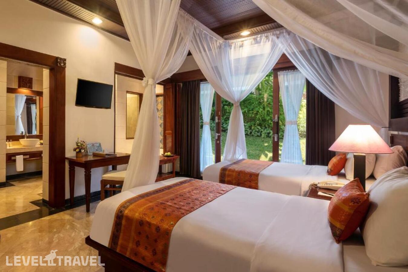 фотографии номера Делюкс (две односпальные кровати) отеля Bali Tropic Resort & Spa в Индонезия(Танжунг Беноа) - фото №1