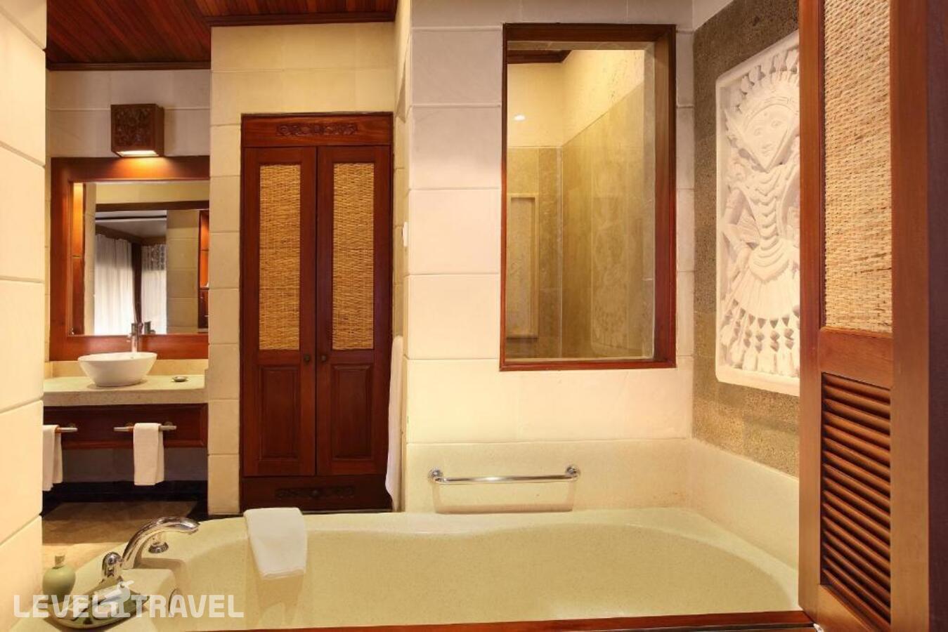 фотографии номера Делюкс (две односпальные кровати) отеля Bali Tropic Resort & Spa в Индонезия(Танжунг Беноа) - фото №2