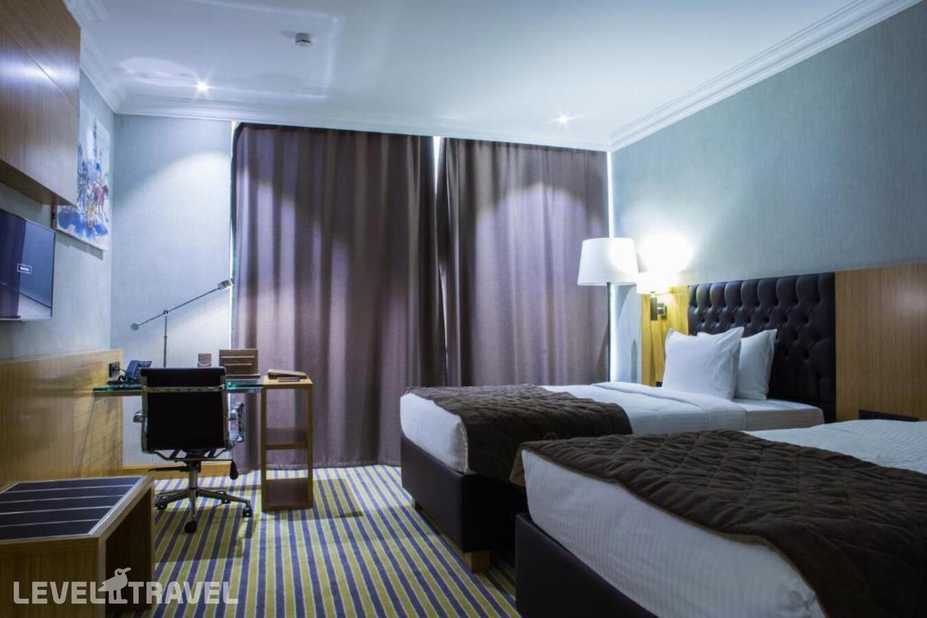 фотографии номера Стандартный (две односпальные кровати) отеля Aidana Plaza Hotel в Казахстан(Шымкент) - фото №1
