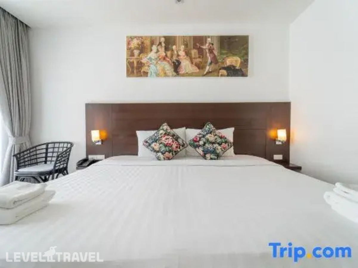 фотографии номера Делюкс с балконом отеля Rodina Beach Hotel (Ex. Isawanya Beach Resort) в Таиланд(Джомтьен) - фото №5