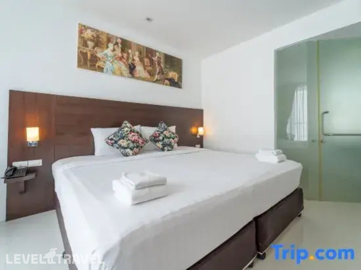 фотографии номера Делюкс с балконом отеля Rodina Beach Hotel (Ex. Isawanya Beach Resort) в Таиланд(Джомтьен) - фото №4