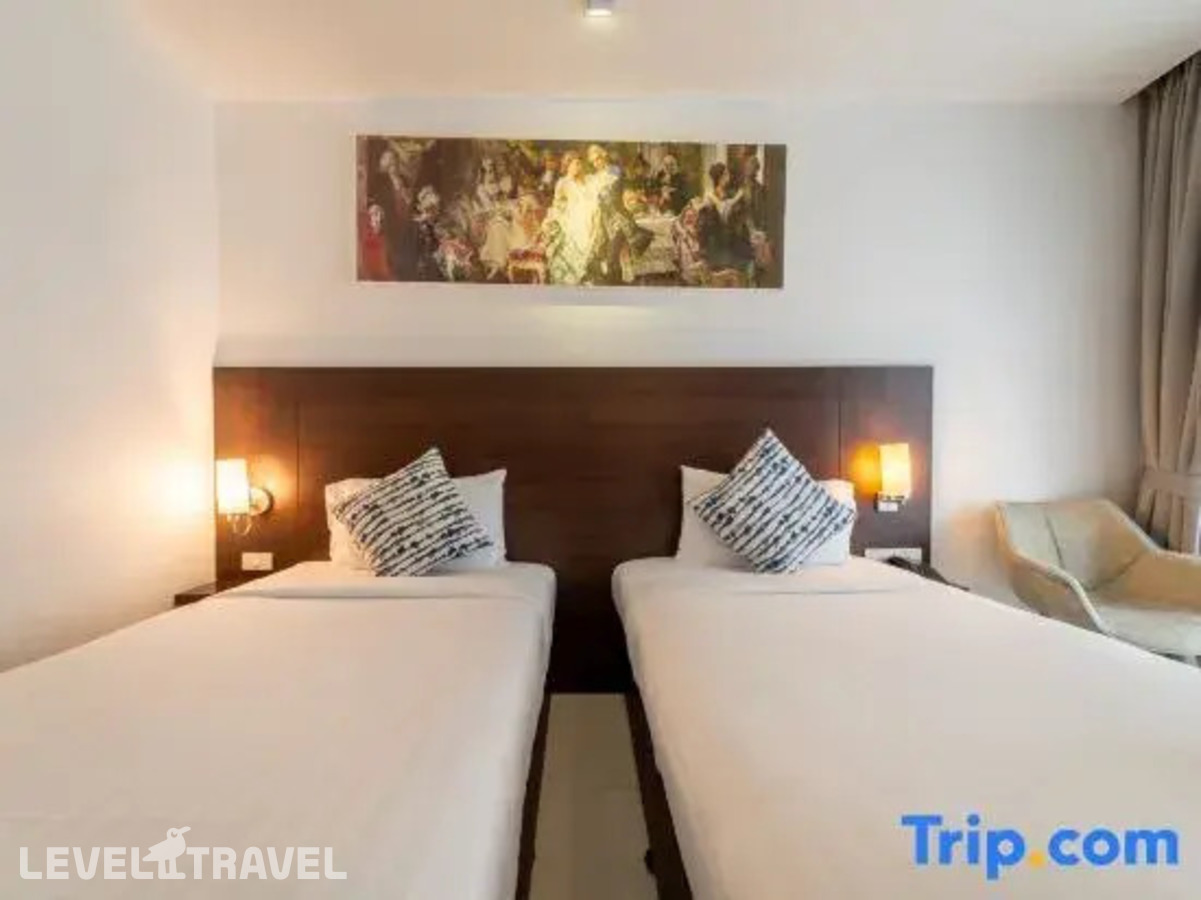 фотографии номера Делюкс с балконом отеля Rodina Beach Hotel (Ex. Isawanya Beach Resort) в Таиланд(Джомтьен) - фото №9