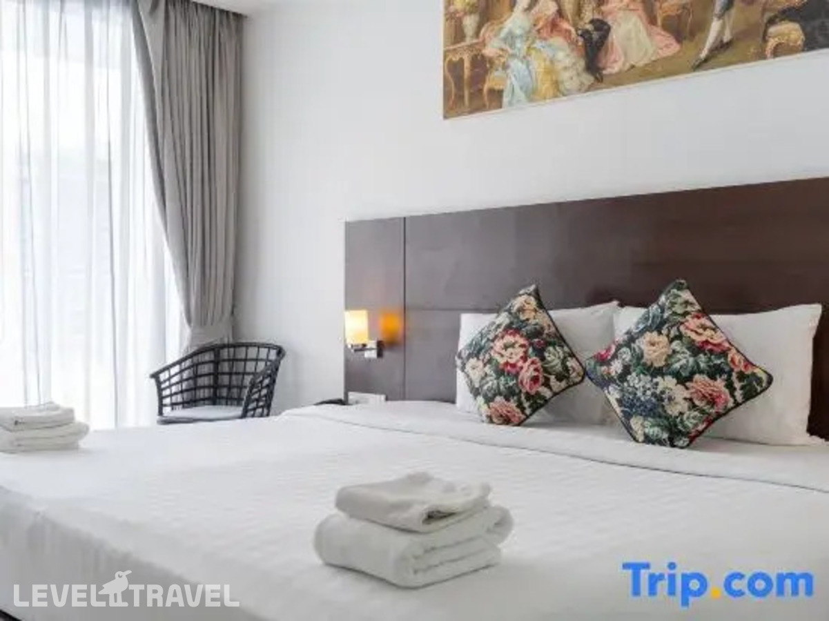 фотографии номера Делюкс с балконом отеля Rodina Beach Hotel (Ex. Isawanya Beach Resort) в Таиланд(Джомтьен) - фото №7