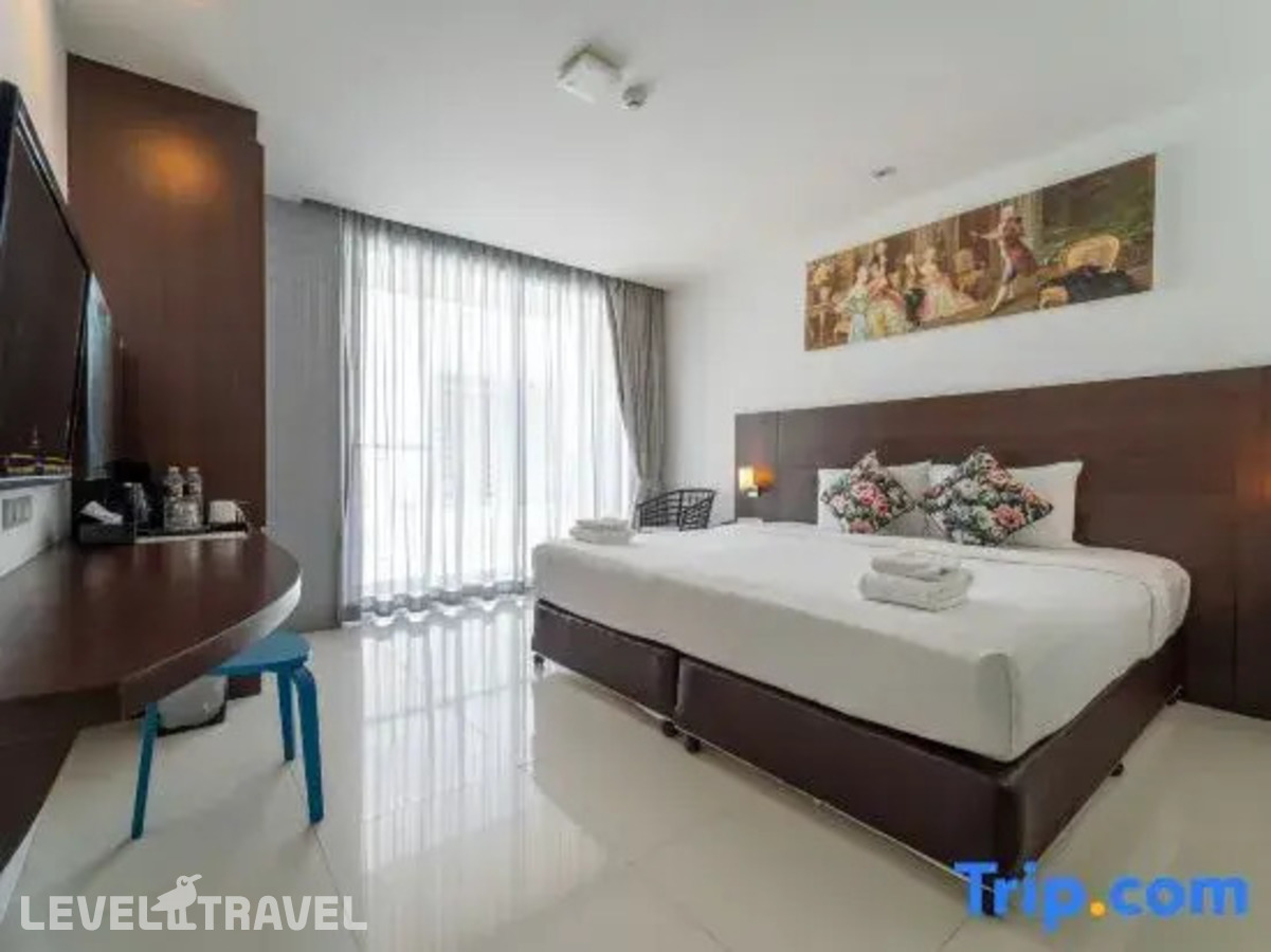 фотографии номера Делюкс с балконом отеля Rodina Beach Hotel (Ex. Isawanya Beach Resort) в Таиланд(Джомтьен) - фото №8