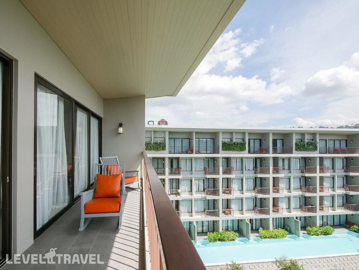 фотографии номера Полулюкс с видом на бассейн отеля Proud Phuket Hotel в Таиланд(Най Янг Бич) - фото №4