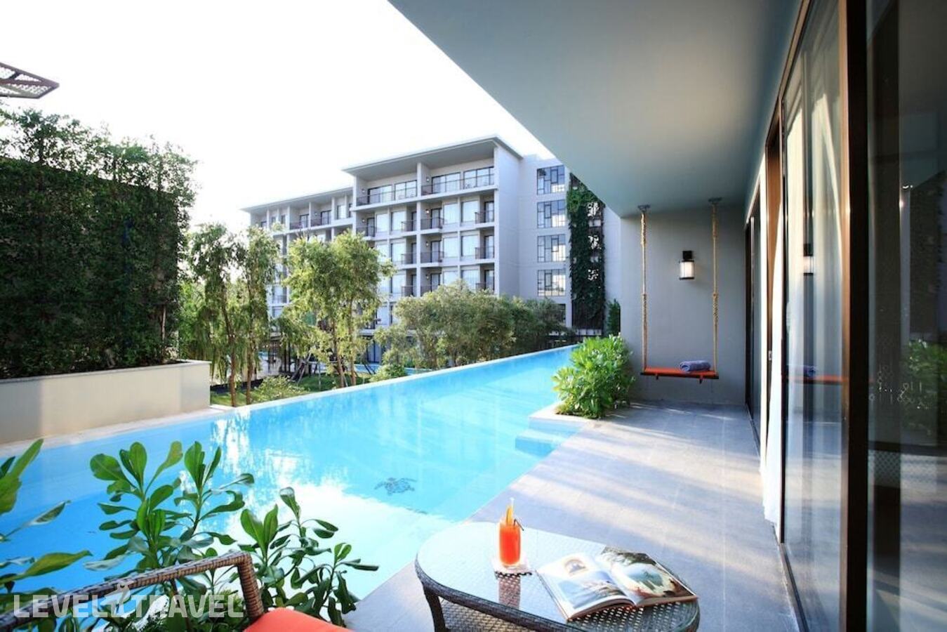 фотографии номера Полулюкс с выходом к бассейну отеля Proud Phuket Hotel в Таиланд(Най Янг Бич) - фото №5