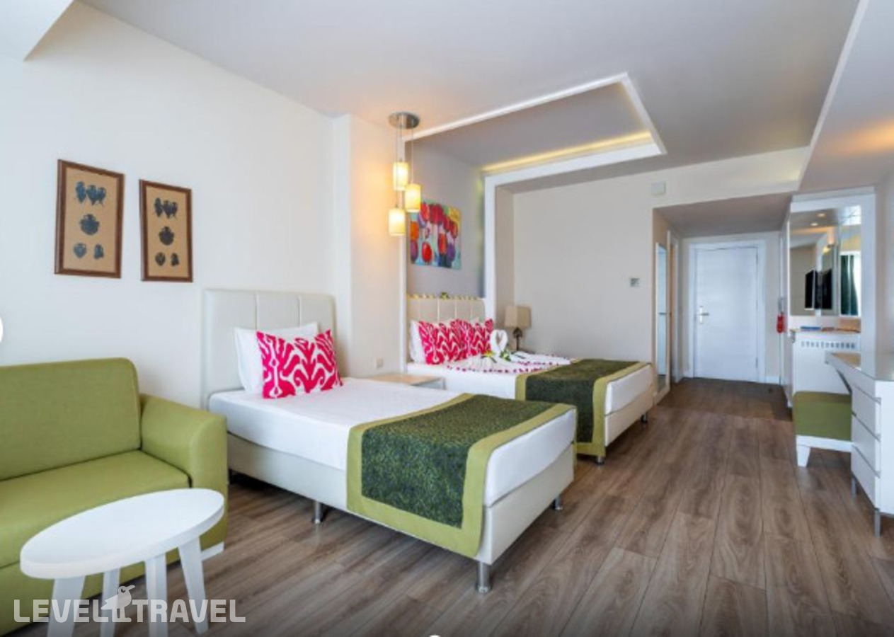 фотографии номера Трехместный с видом на море отеля Orange County Resort Hotel Alanya в Турция(Окурджалар) - фото №2