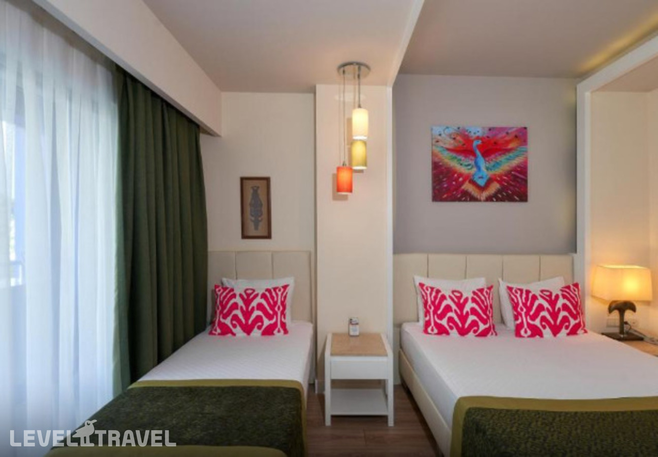 фотографии номера Трехместный с видом на море отеля Orange County Resort Hotel Alanya в Турция(Окурджалар) - фото №1