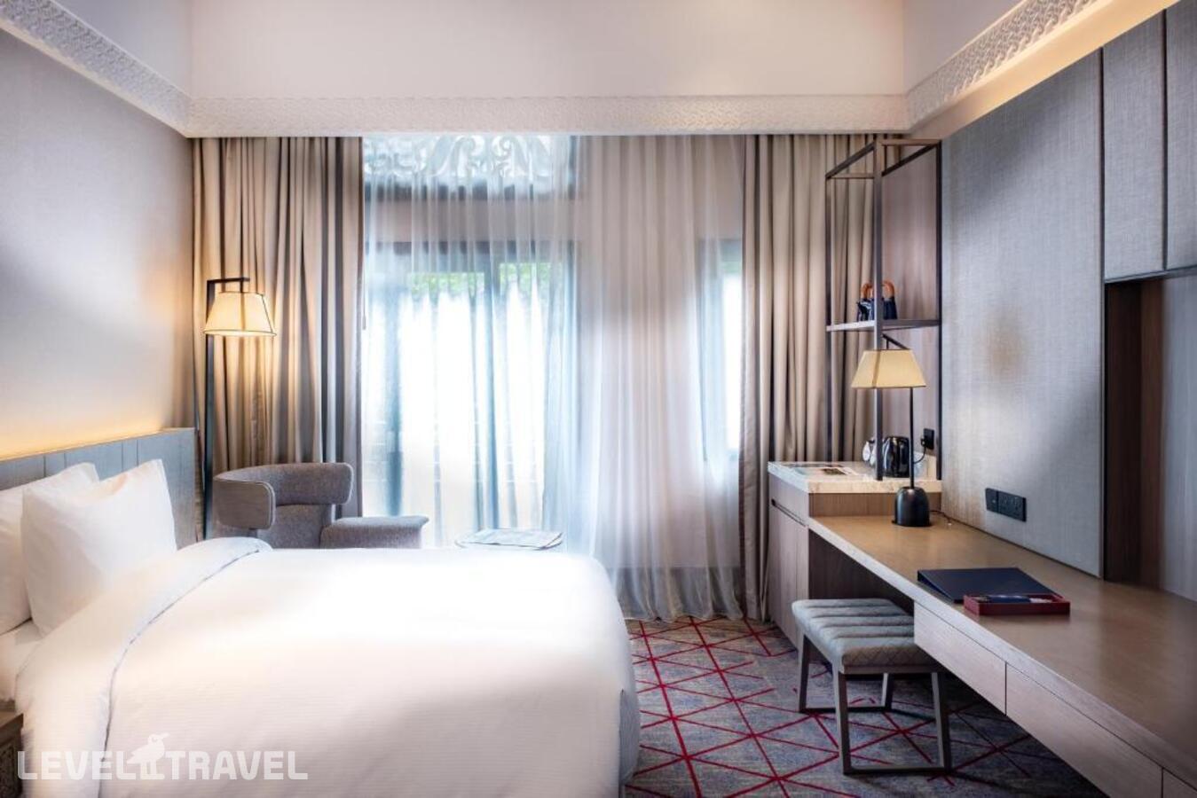 фотографии номера Делюкс (две односпальные кровати) отеля Doubletree By Hilton Putrajaya Lakeside в Малайзия(Куала-Лумпур) - фото №1