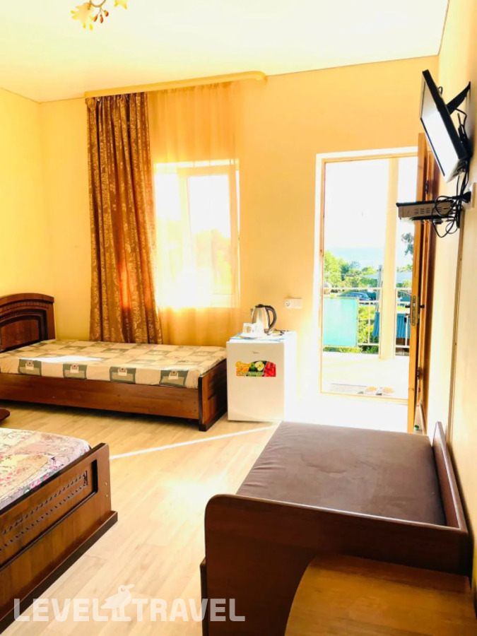 фотографии номера Стандартный номер отеля Гостевой Дом Бугенвиллия в Абхазия(Новый Афон) - фото №1