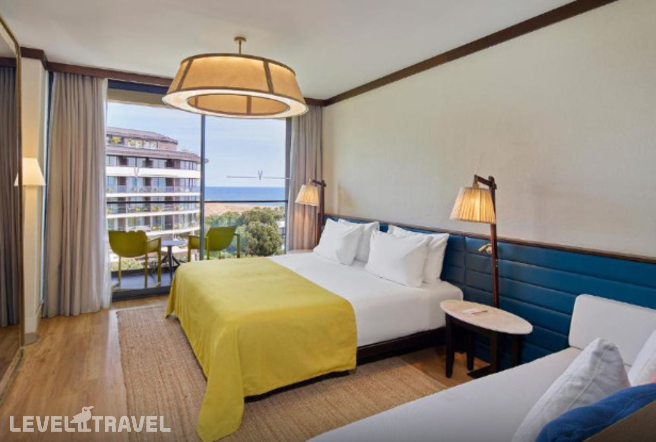 фотографии номера Стандартный с боковым видом на море отеля Voyage Belek Golf & Spa (Ex. Club Voyage Belek Select) в Турция(Белек) - фото №1