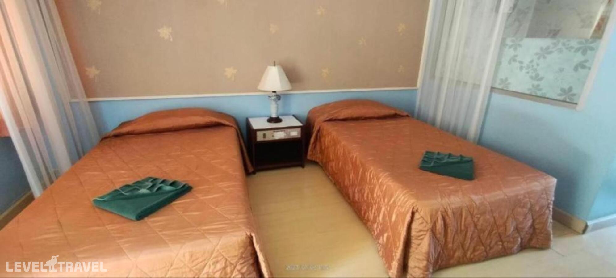 фотографии номера Делюкс (две односпальные кровати) отеля Riviera Resort в Таиланд(Наклуа) - фото №22