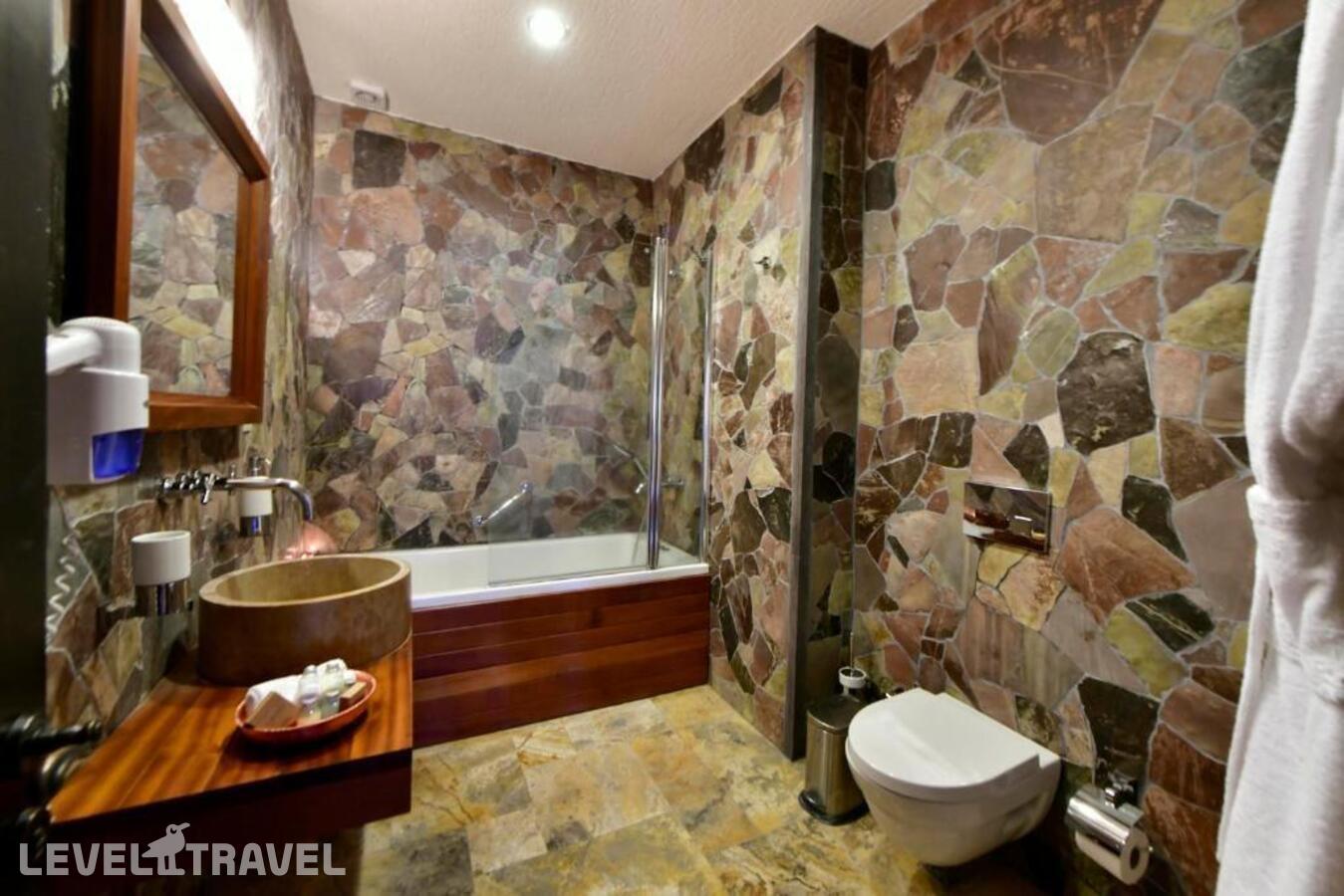 фотографии номера Делюкс отеля Cappadocia Estates в Турция(Ургюп) - фото №2