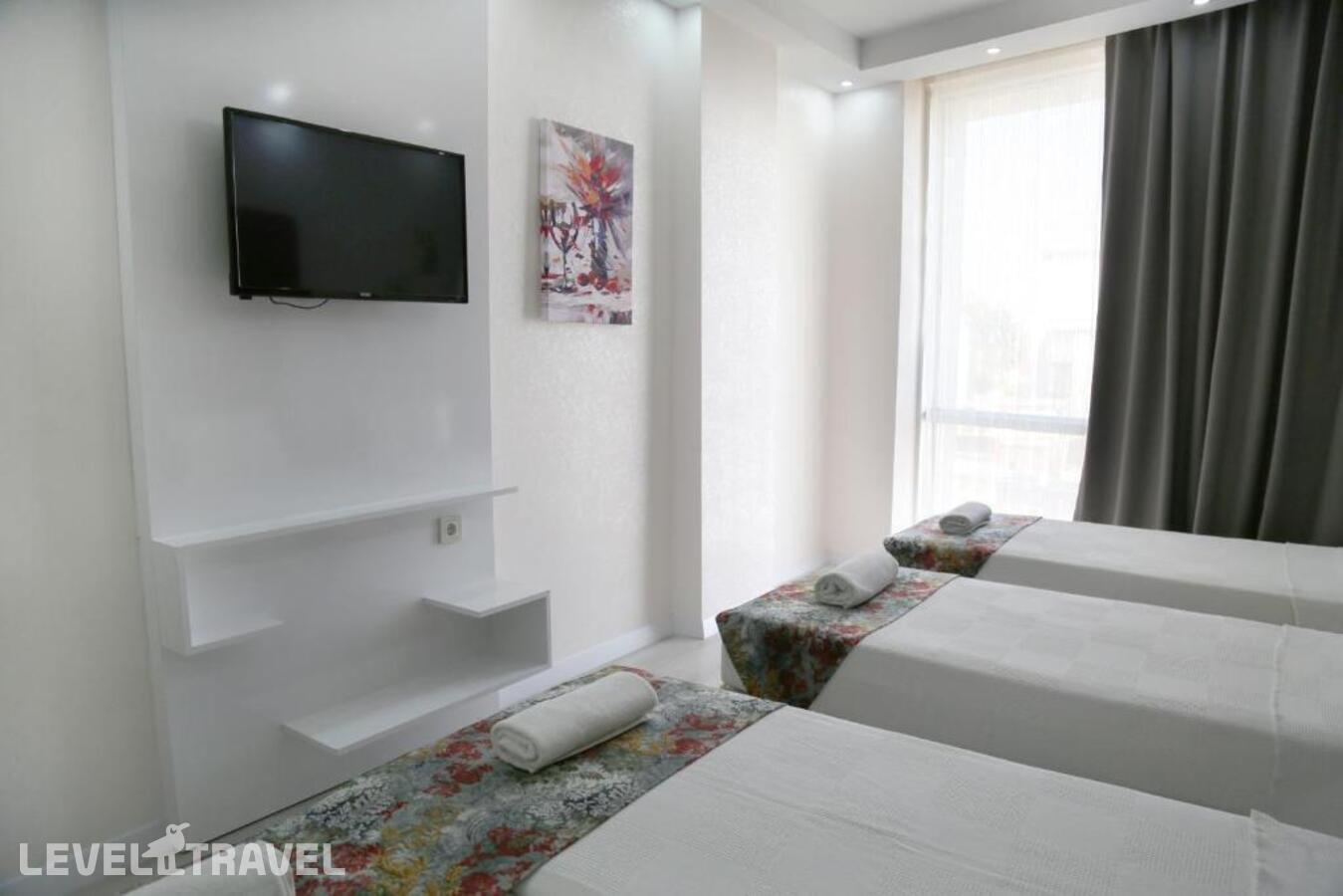 фотографии номера Четырехместный номер отеля Istanbul Fair Hotel в Турция(Кючюкчекмедже) - фото №4