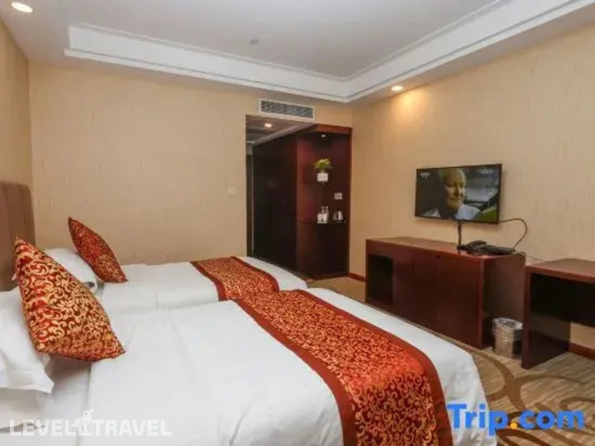 фотографии номера Делюкс (две односпальные кровати) отеля Shanghai Astronautic Hotel в Китай(Шанхай) - фото №6