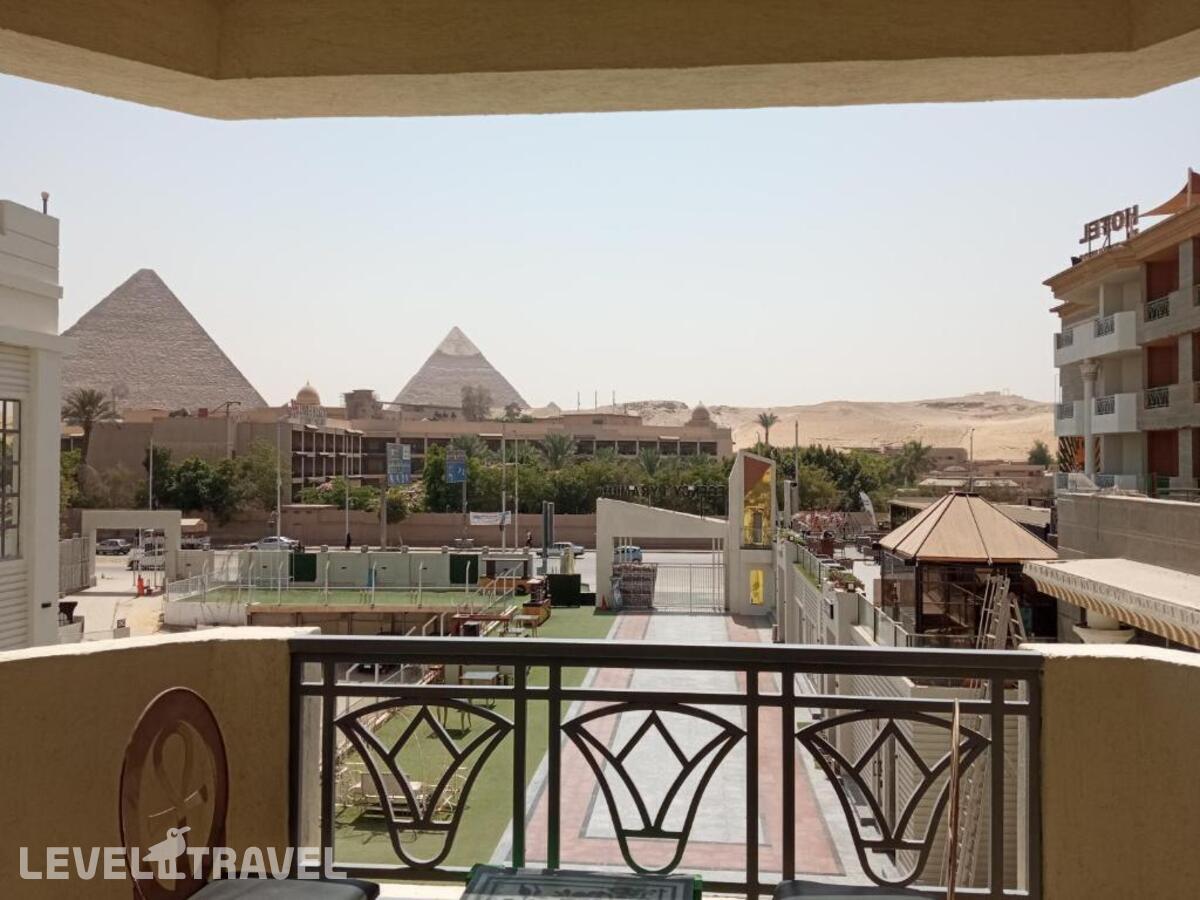 фотографии номера Двухместный номер Superior with Pyramids View двуспальная кровать отеля Regency Pyramids Hotel в Египет(Каир) - фото №5
