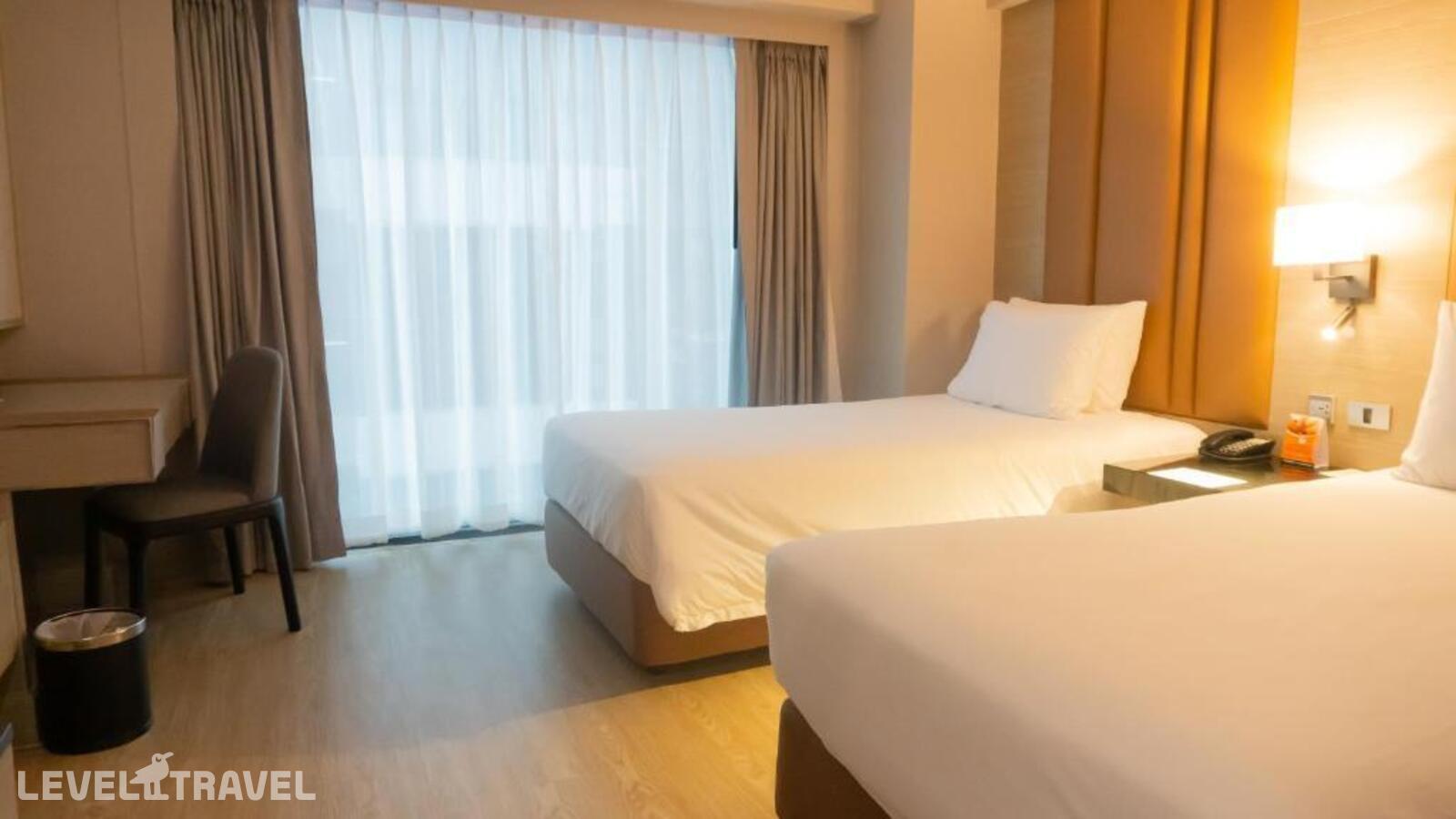 фотографии номера Премьер (две односпальные кровати) отеля Ramada By Wyndham Bangkok Sukhumvit 11 в Таиланд(Бангкок) - фото №3