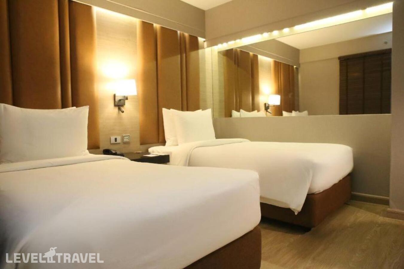 фотографии номера Премьер (две односпальные кровати) отеля Ramada By Wyndham Bangkok Sukhumvit 11 в Таиланд(Бангкок) - фото №2