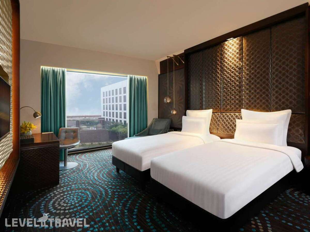 фотографии номера Делюкс (две односпальные кровати) отеля Pullman New Delhi Aerocity- International Airport в Индия(Нью-Дели) - фото №1