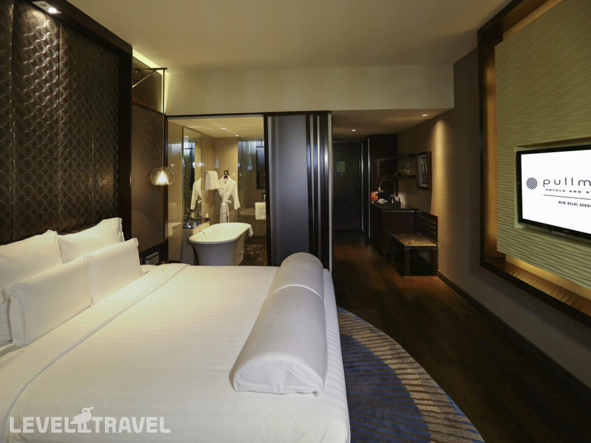 фотографии номера Двухместный клубный номер Executive двуспальная кровать отеля Pullman New Delhi Aerocity- International Airport в Индия(Нью-Дели) - фото №3