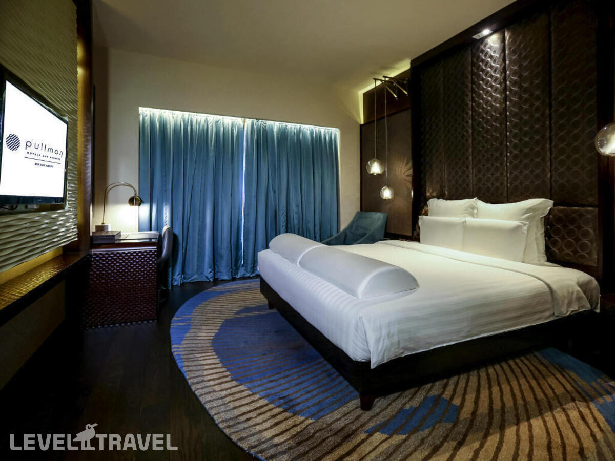 фотографии номера Двухместный клубный номер Executive двуспальная кровать отеля Pullman New Delhi Aerocity- International Airport в Индия(Нью-Дели) - фото №2