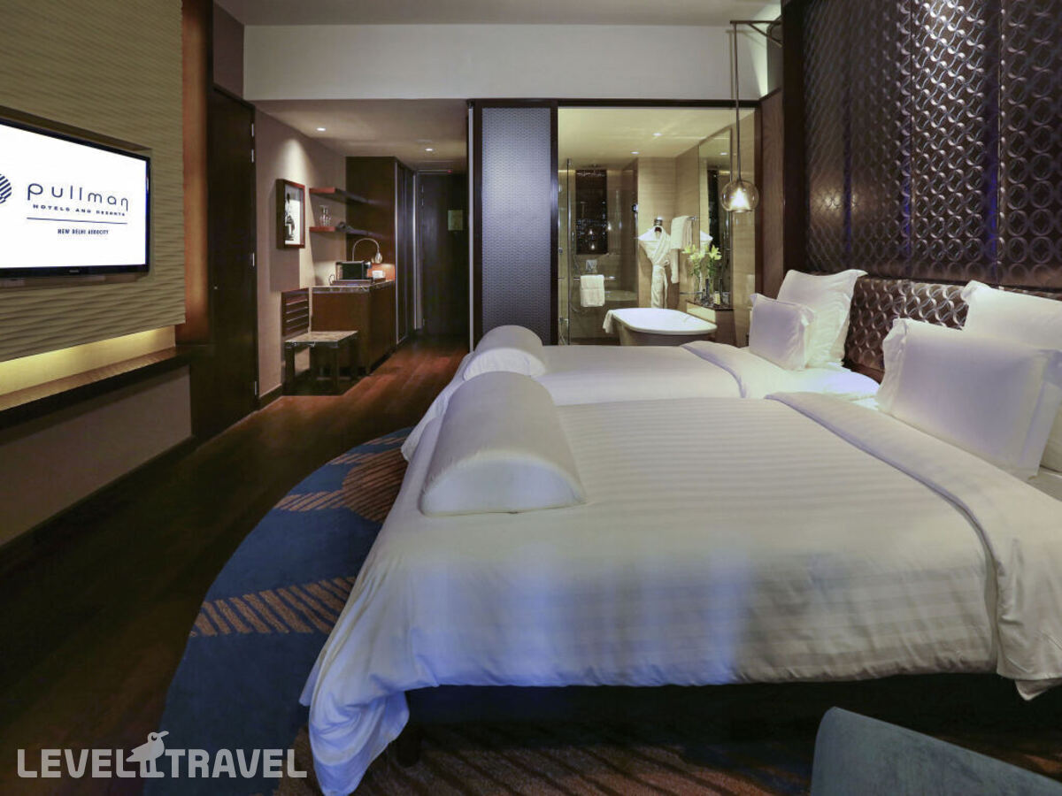 фотографии номера Двухместный клубный номер Executive 2 отдельные кровати отеля Pullman New Delhi Aerocity- International Airport в Индия(Нью-Дели) - фото №2