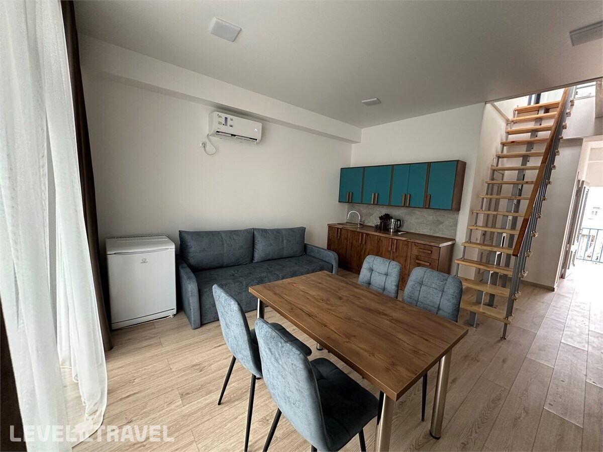 фотографии номера Двухуровневый полулюкс с видом на море отеля Santorini Family Club Hotel в Россия(Каспийск) - фото №7
