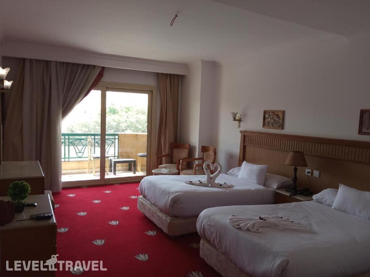 фотографии номера Двухместный номер Deluxe with Pyramids View 2 отдельные кровати отеля Regency Pyramids Hotel в Египет(Каир) - фото №5