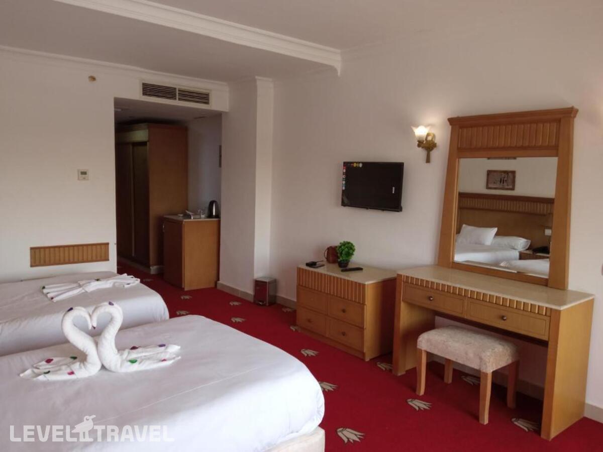 фотографии номера Двухместный номер Deluxe with Pyramids View 2 отдельные кровати отеля Regency Pyramids Hotel в Египет(Каир) - фото №3