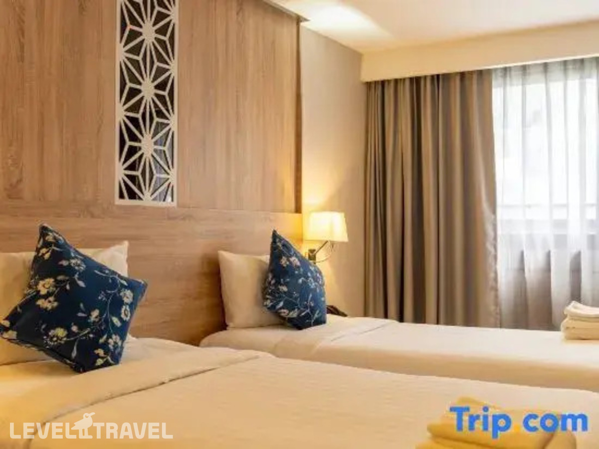 фотографии номера Делюкс с видом на город отеля Rodina Beach Hotel (Ex. Isawanya Beach Resort) в Таиланд(Джомтьен) - фото №1