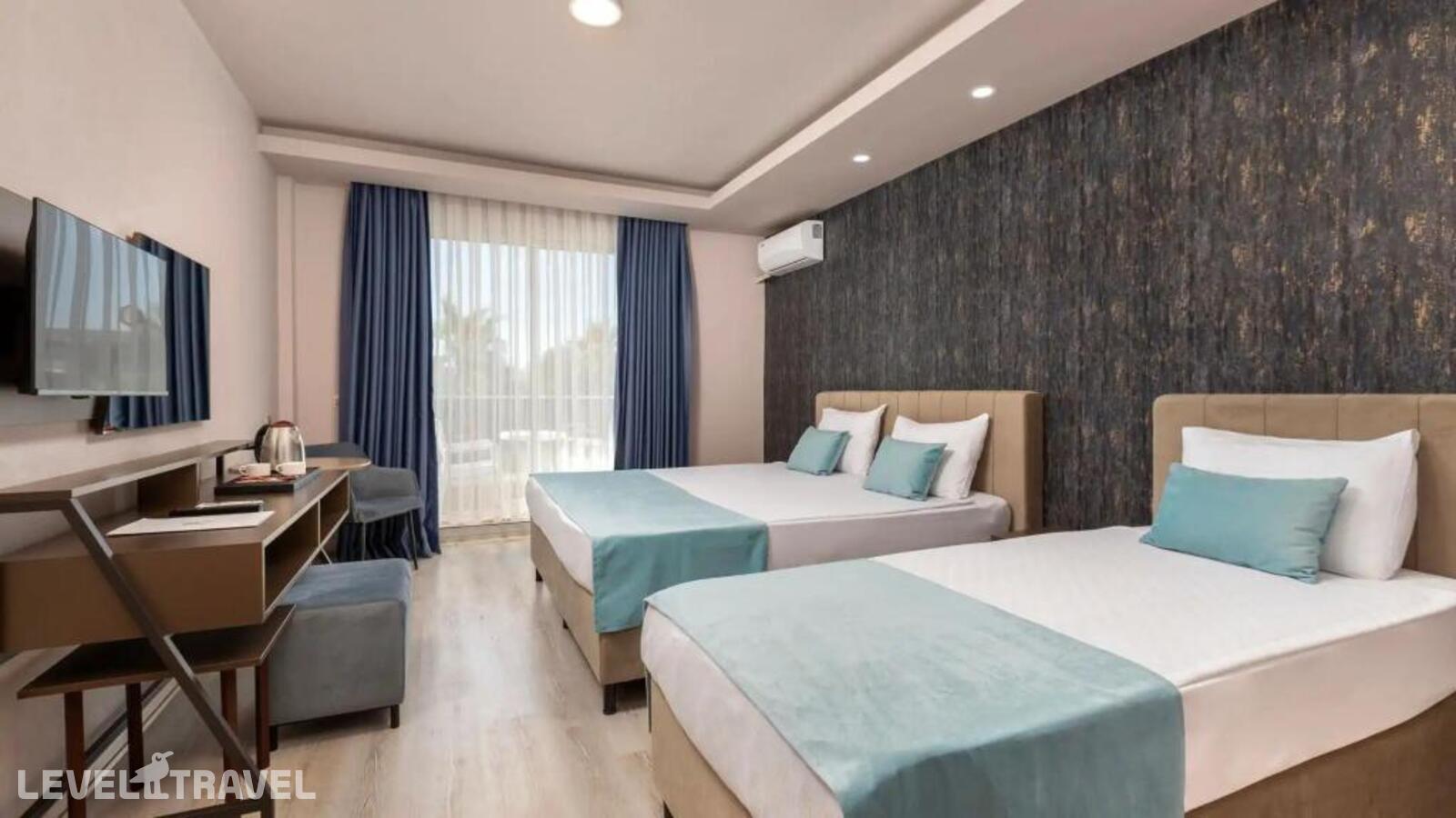 фотографии номера Трехместный номер отеля Hotella Hotel & Spa в Турция(Белек) - фото №1